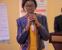 Irene Ayot Chono from UNICEF speaking at the launch of the draft manual of the Parenting Guidelines